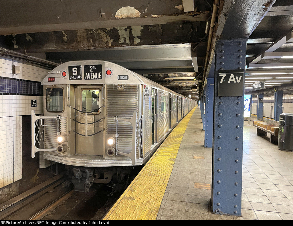 The R32 set is about to depart 7th Ave-53rd Street Station, enroute from Harlem to the Lower East Side. 